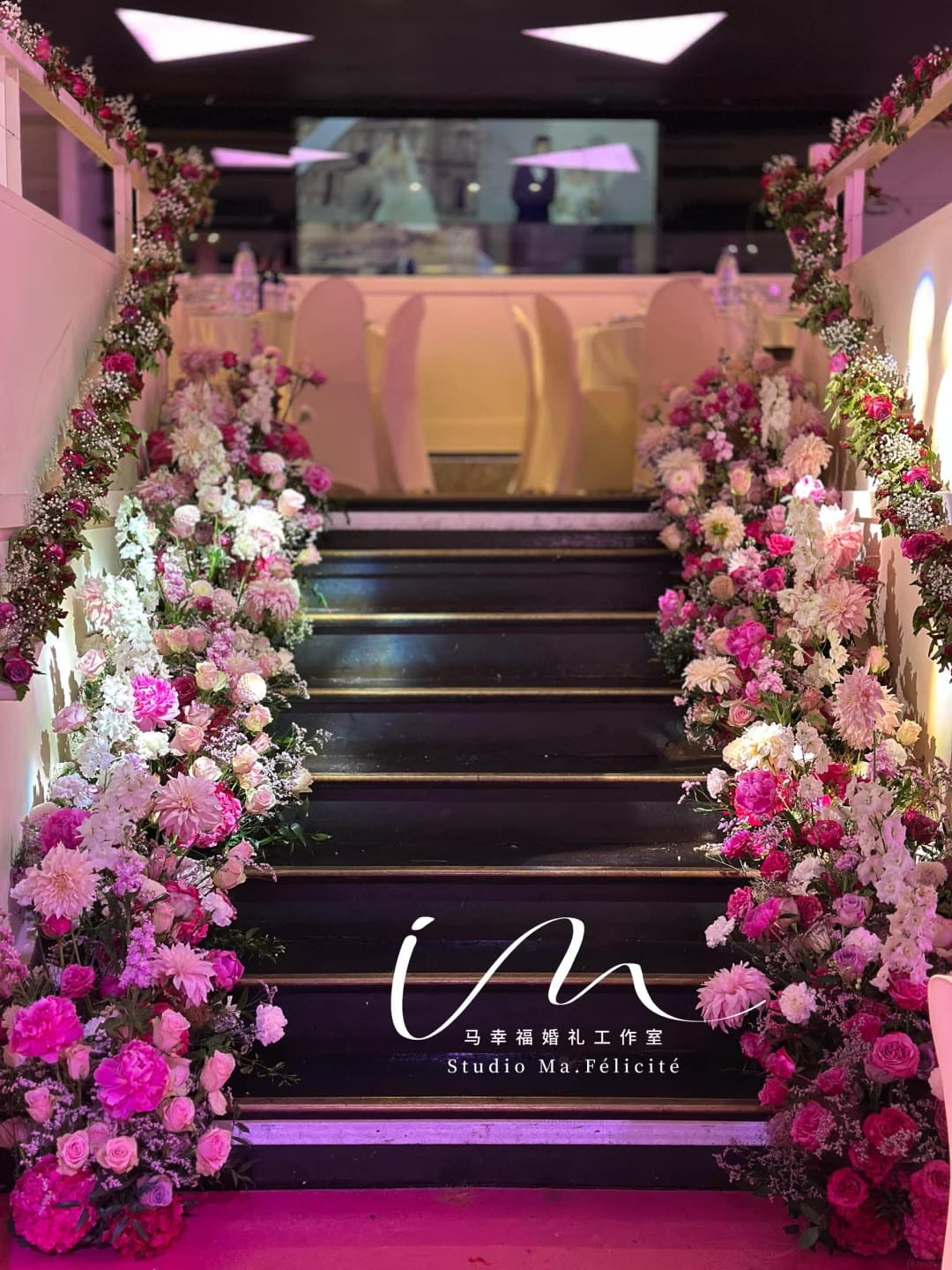 Pink and white floral staircase aisle