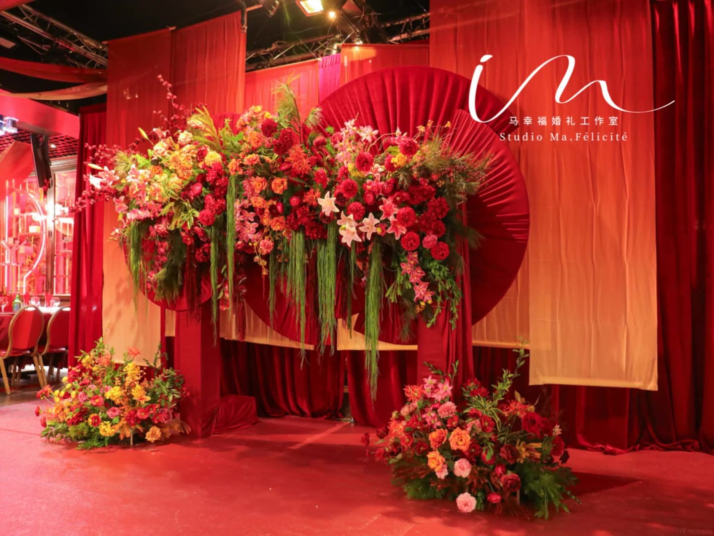 Red and orange traditional Chinese-style floral arrangement